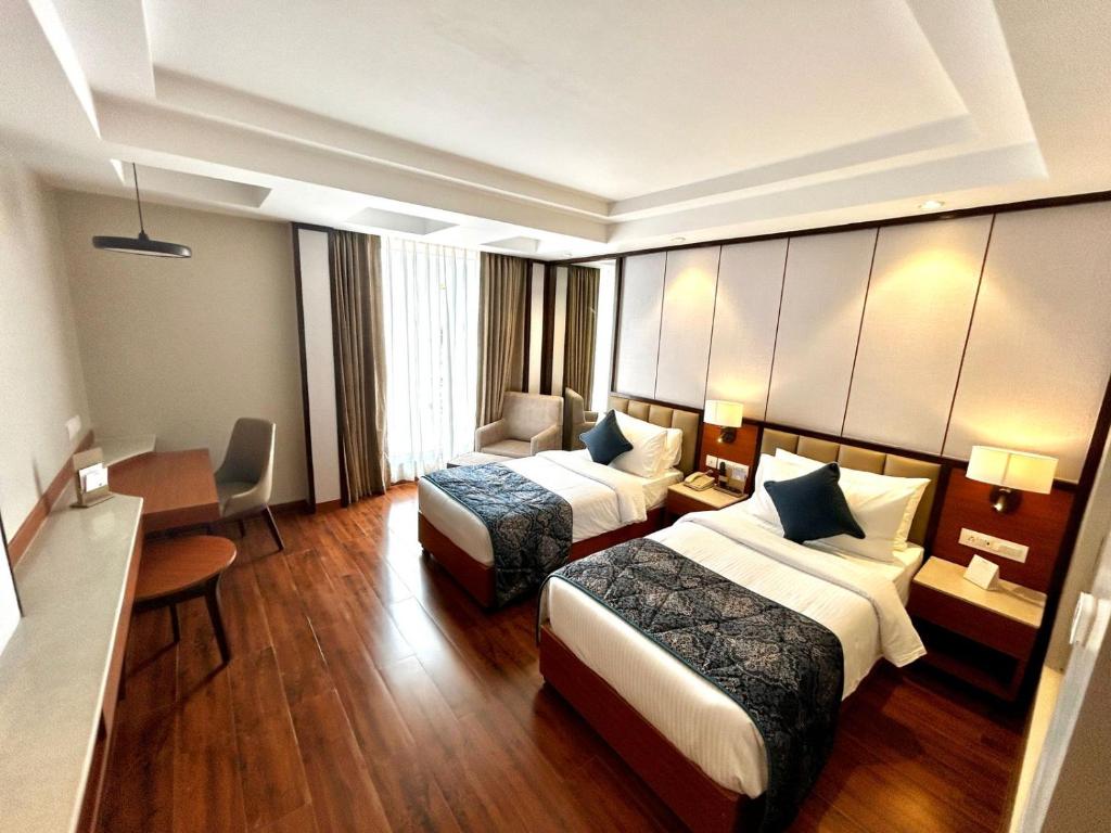 Postel nebo postele na pokoji v ubytování Fortune Select Candolim, Goa - Member ITC Hotels' Group