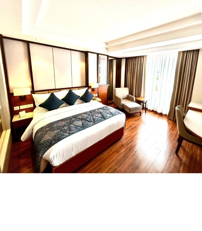 Postel nebo postele na pokoji v ubytování Fortune Select Candolim, Goa - Member ITC Hotels' Group