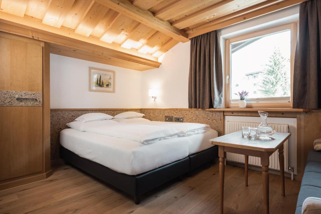 Postel nebo postele na pokoji v ubytování Jochum Hotel Garni