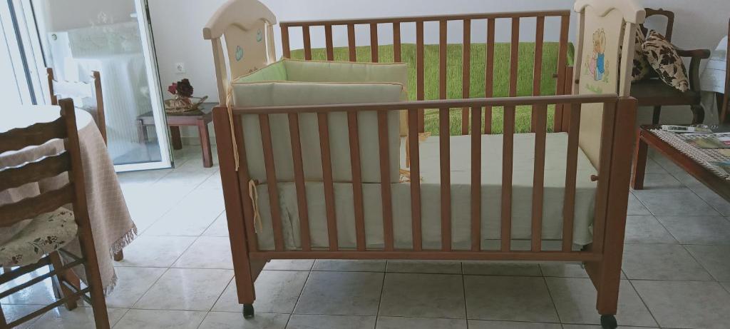 Postel nebo postele na pokoji v ubytování Vagelis 2 Nemea apartments