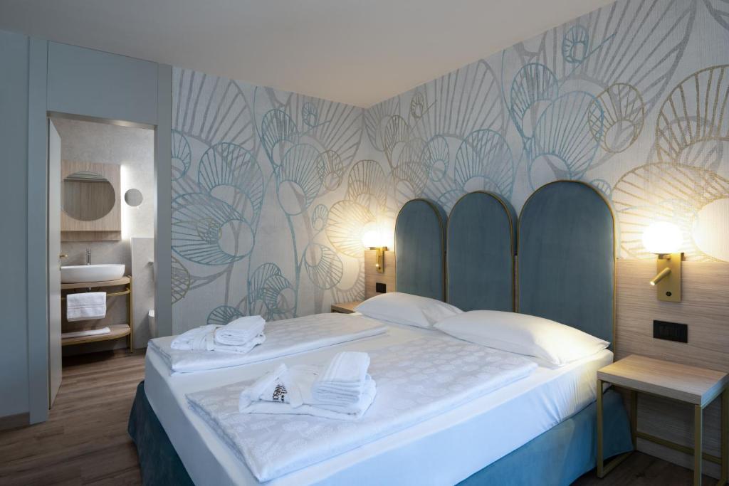 Postel nebo postele na pokoji v ubytování Hotel Sole - Sonne