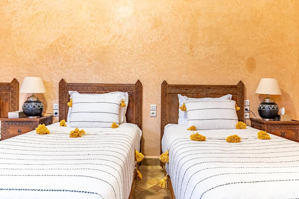Postel nebo postele na pokoji v ubytování Riad N 15 Zefriti
