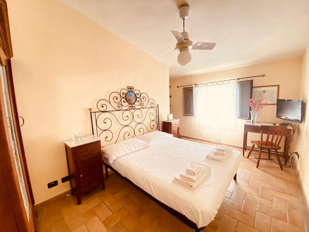 Postel nebo postele na pokoji v ubytování Splendida villa con piscina