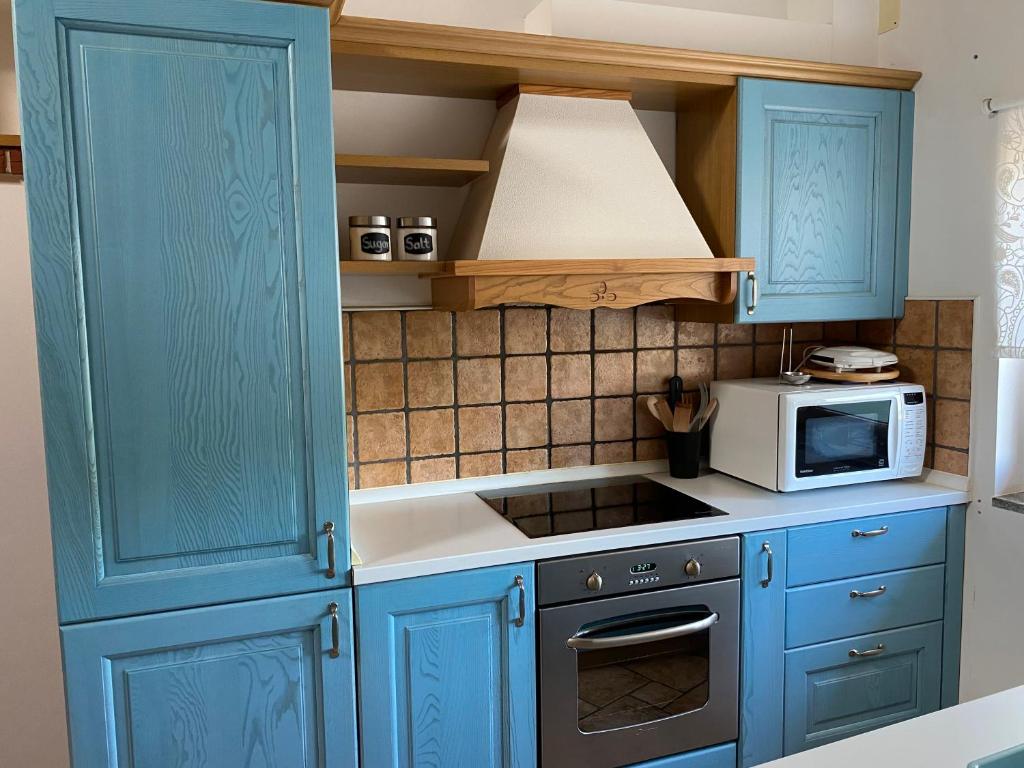Kuchyň nebo kuchyňský kout v ubytování Apartma CASA CELESTE