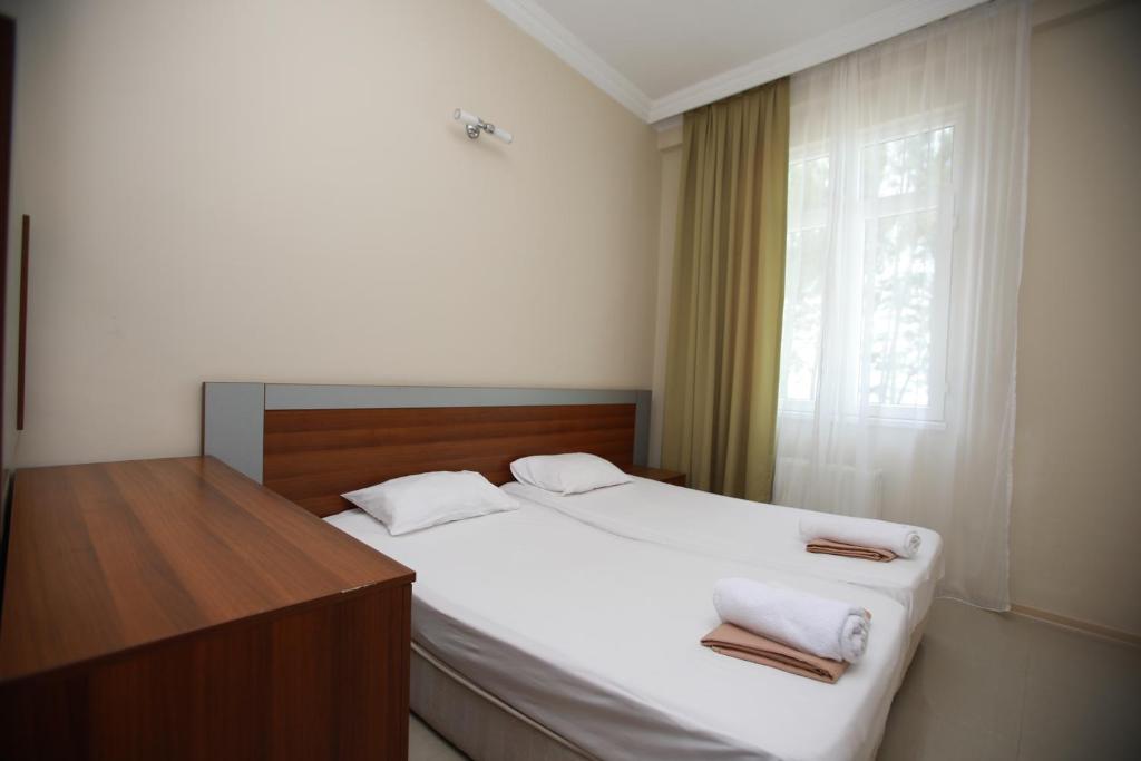 Postel nebo postele na pokoji v ubytování Green House Hotel