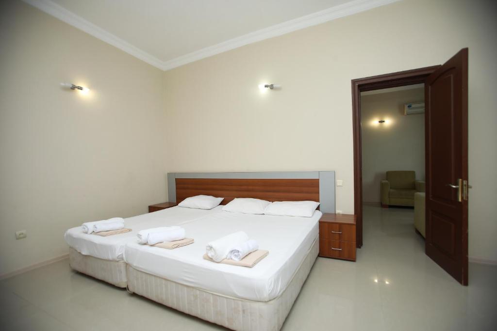 Postel nebo postele na pokoji v ubytování Green House Hotel
