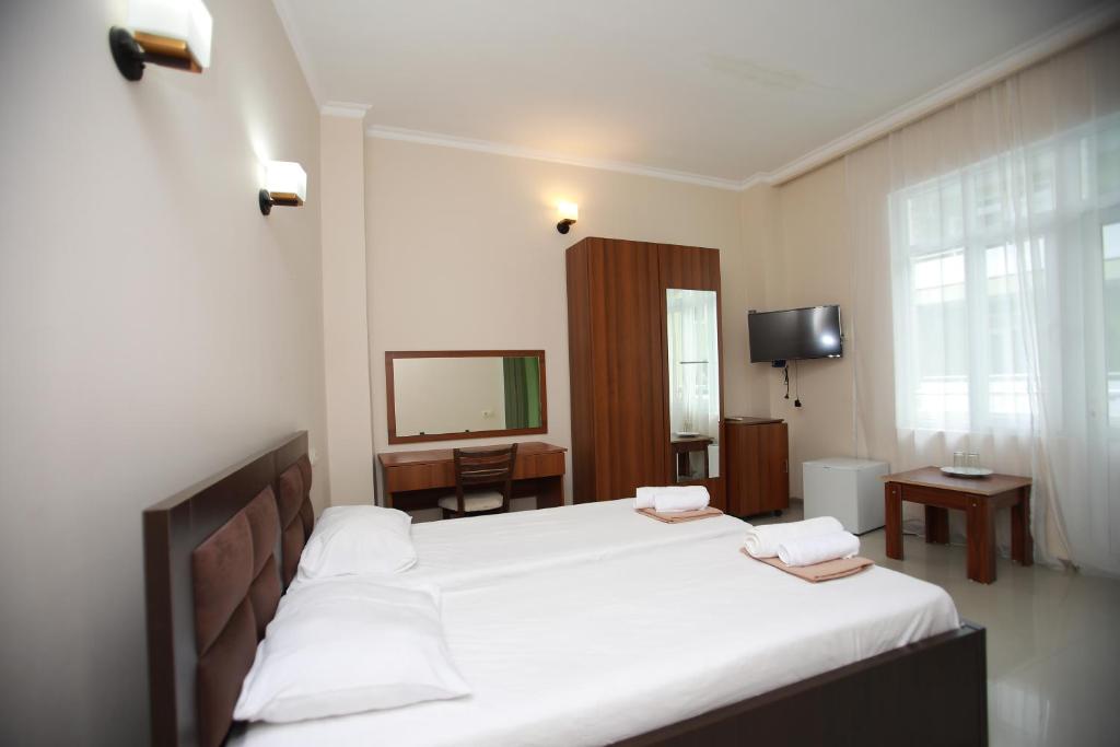 Postel nebo postele na pokoji v ubytování Green House Hotel