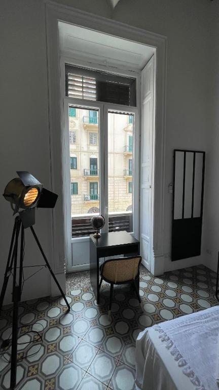 A bed or beds in a room at DonnaFrancaFlorio