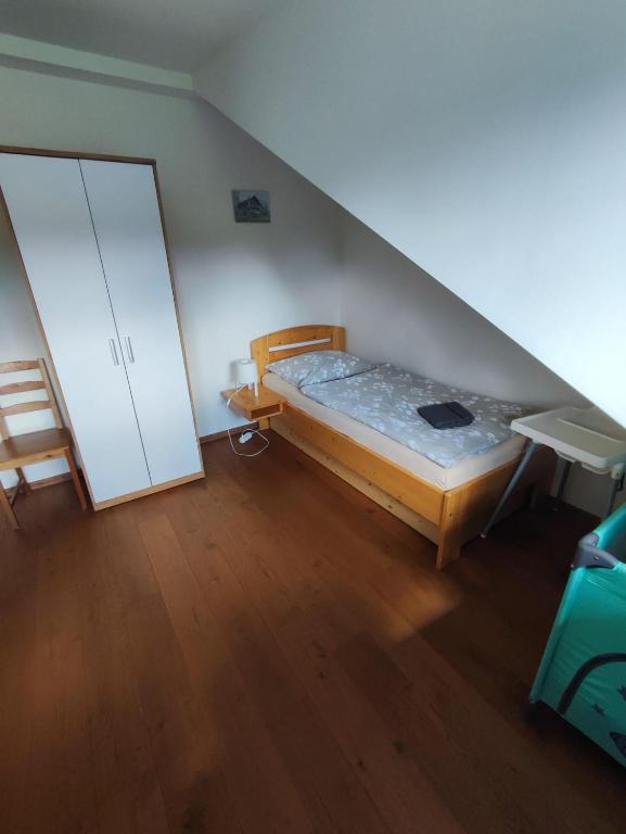 Postel nebo postele na pokoji v ubytování Apartmán Pivoňka
