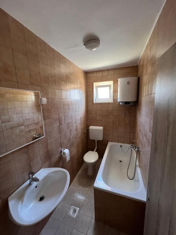 Koupelna v ubytování Apartmani Nika