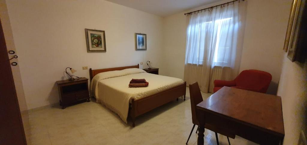 A bed or beds in a room at La lepre nella Luna