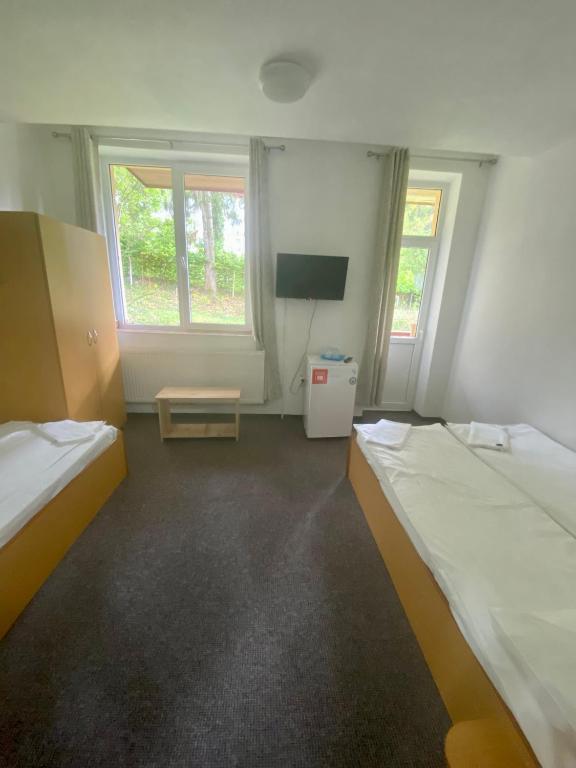 Postel nebo postele na pokoji v ubytování Vila Onix