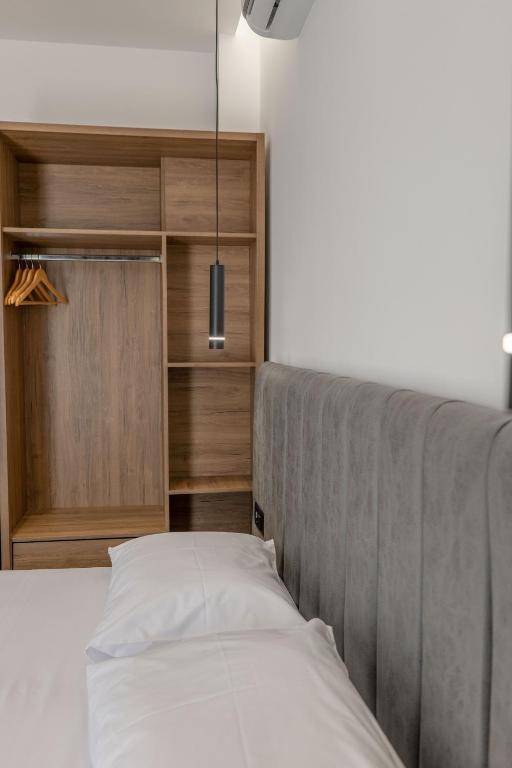 Postel nebo postele na pokoji v ubytování Keos Hotel