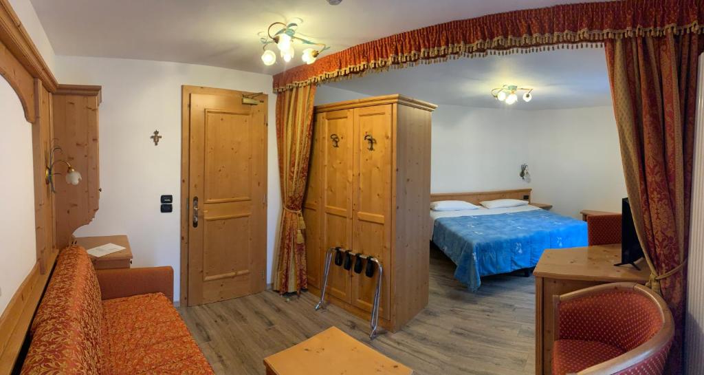Posteľ alebo postele v izbe v ubytovaní Hotel Laurin