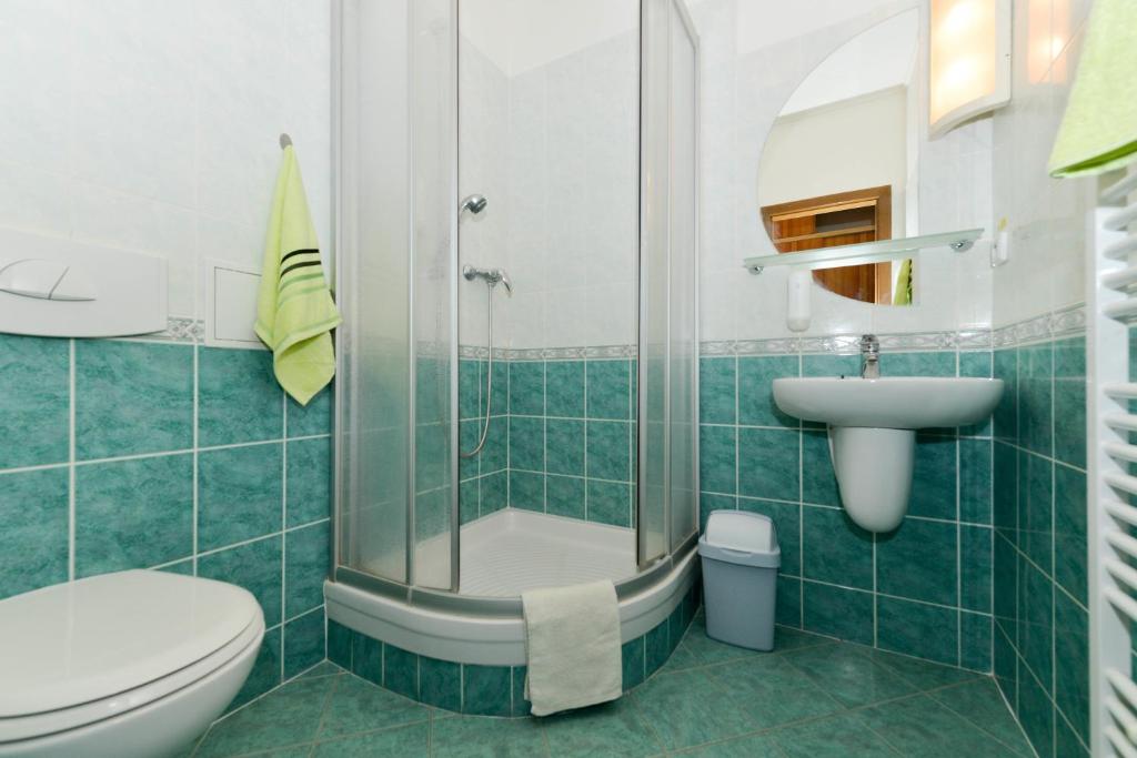 Koupelna v ubytování Hotel Trilobit