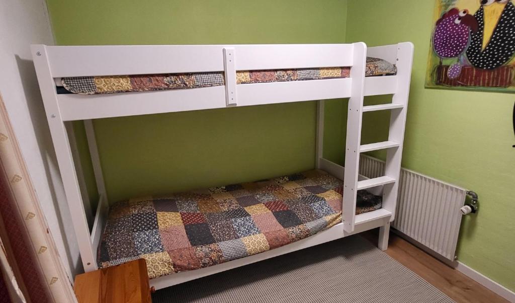 Postel nebo postele na pokoji v ubytování Gadegaard Apartment