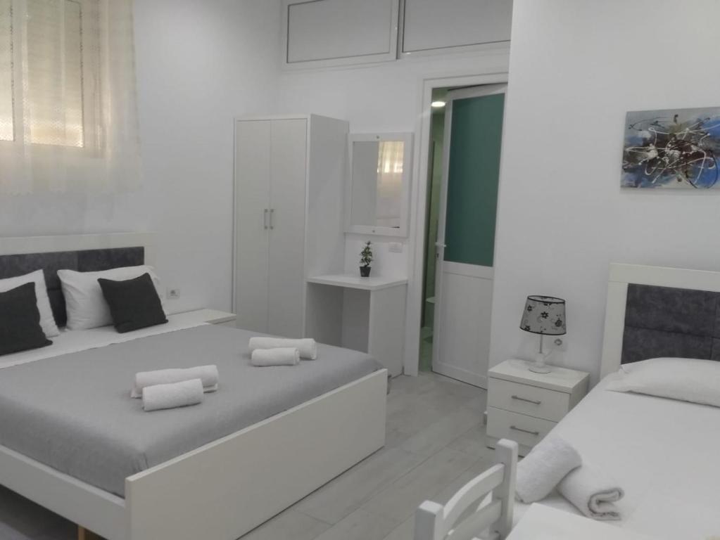 Postel nebo postele na pokoji v ubytování Deka-X Rooms