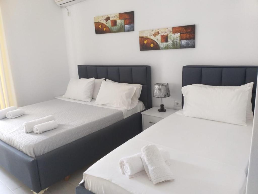 Postel nebo postele na pokoji v ubytování Deka-X Rooms