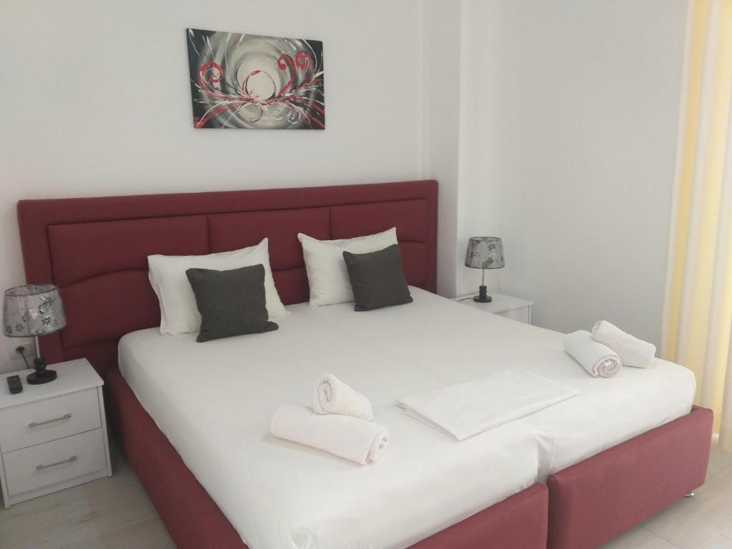 Postel nebo postele na pokoji v ubytování Deka-X Rooms