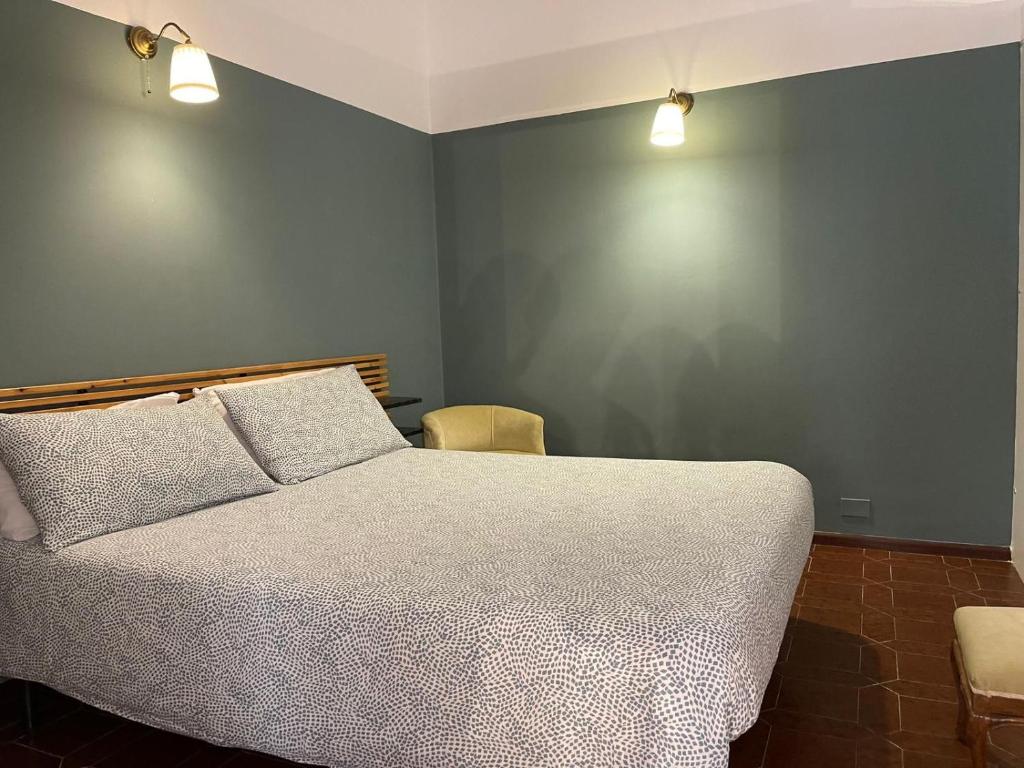 Łóżko lub łóżka w pokoju w obiekcie Casa Mia Sea&Center