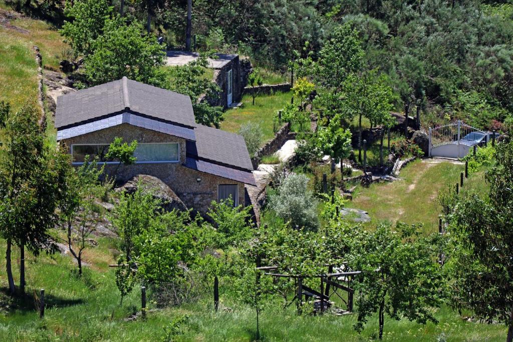 an aerial view of a house in a field at Casa do Monte 2 in Castro Daire