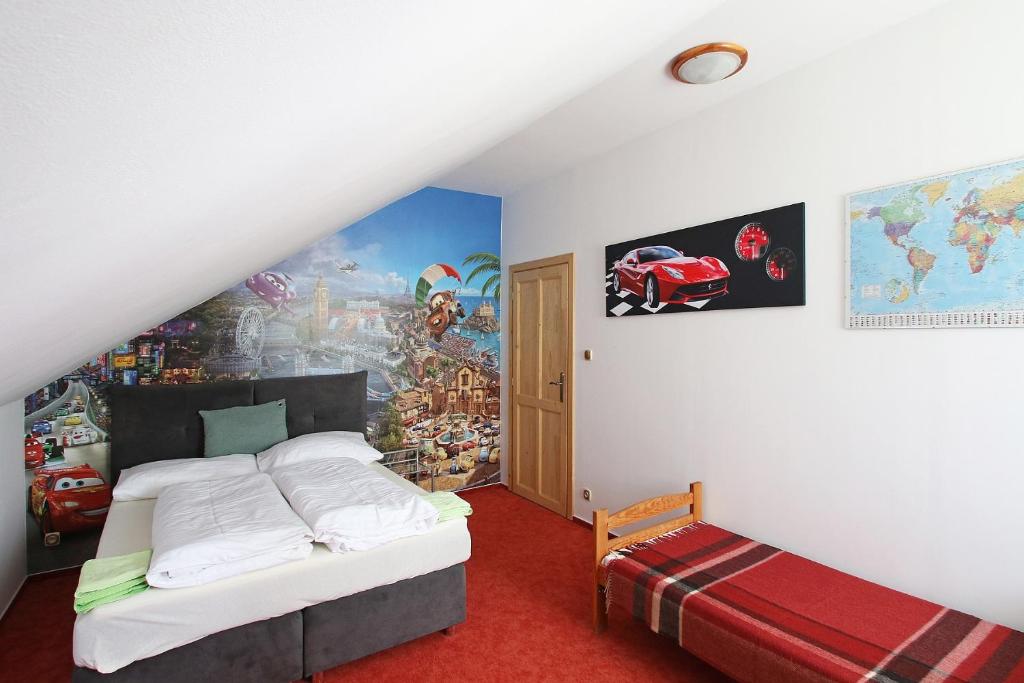 Postel nebo postele na pokoji v ubytování Apartmány HABURA