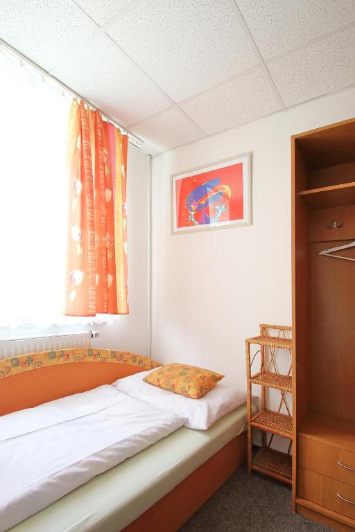 Postel nebo postele na pokoji v ubytování Apartmány HABURA