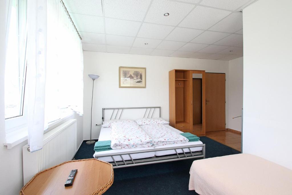 Postel nebo postele na pokoji v ubytování Apartmány HABURA