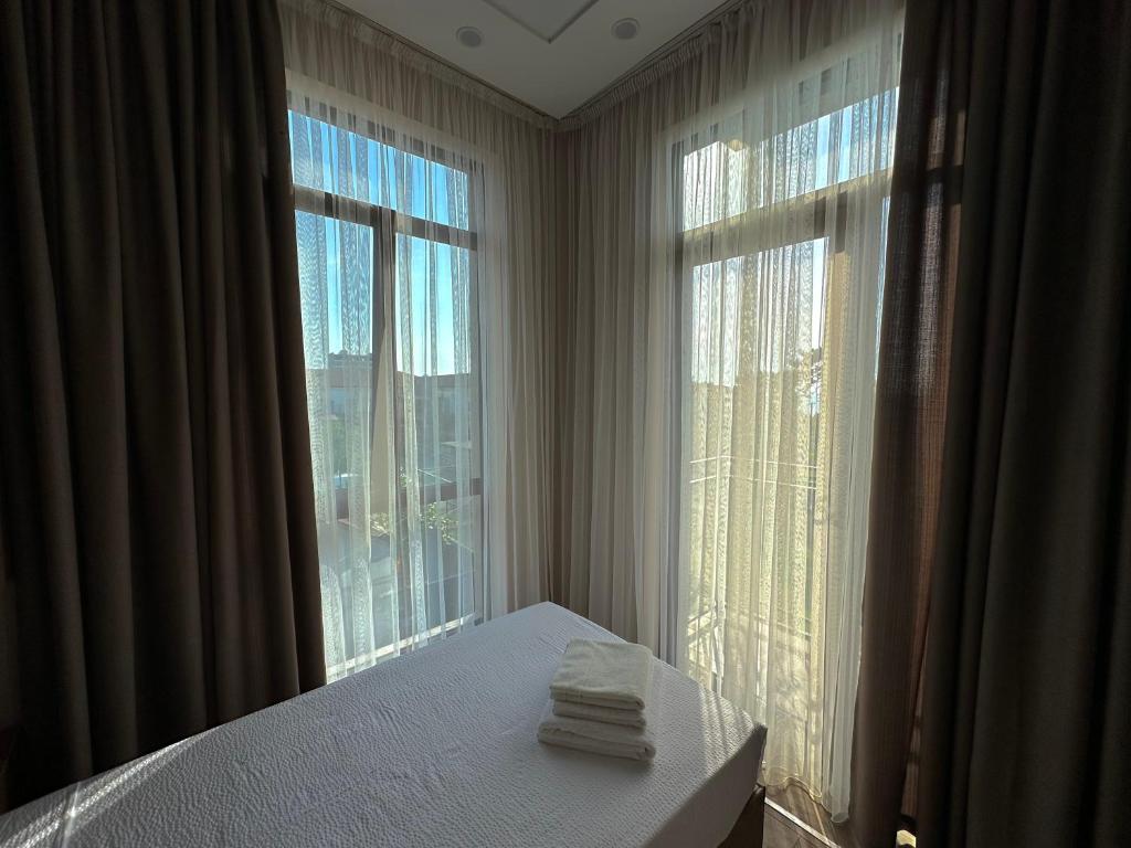 Letto o letti in una camera di Ameli Apartments BTM