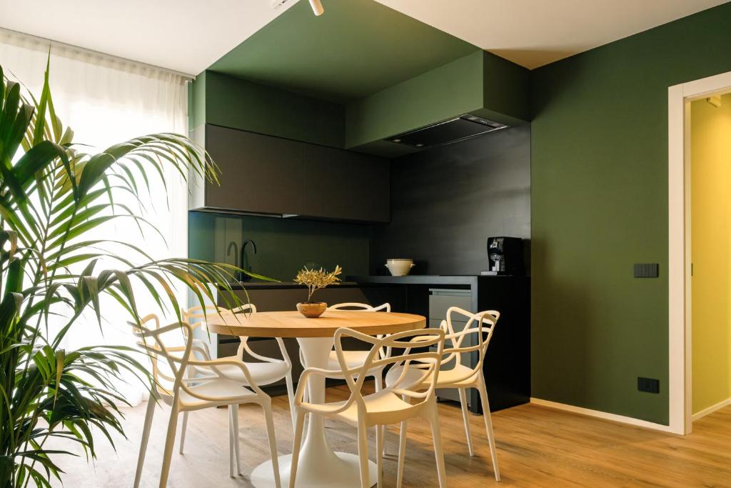 Kuchyň nebo kuchyňský kout v ubytování Camoma Aparthotel - Suites Apartments