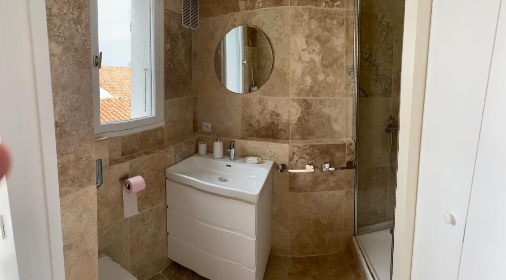 Et badeværelse på L'appartement des Dunes