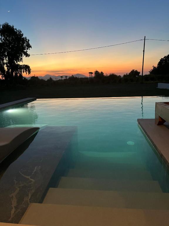 Bazén v ubytování Aphrodite Luxury Suites with private heated pools nebo v jeho okolí