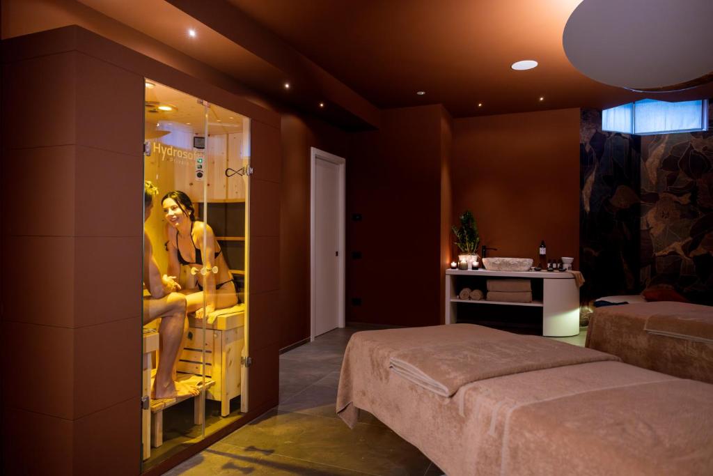 Łóżko lub łóżka w pokoju w obiekcie Palace Hotel Città