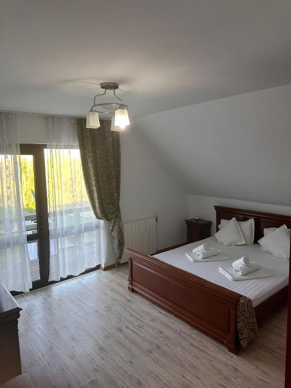 Postel nebo postele na pokoji v ubytování Casa Donau Beach
