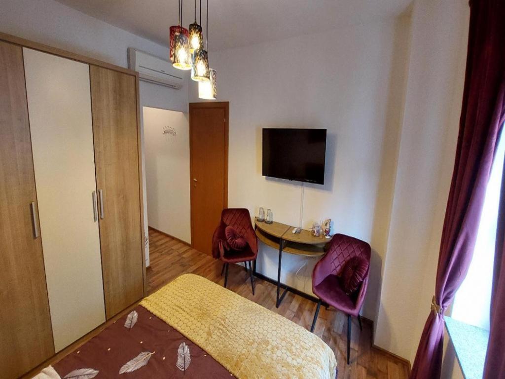 TV a/nebo společenská místnost v ubytování 4 Colors Rooms, Cres