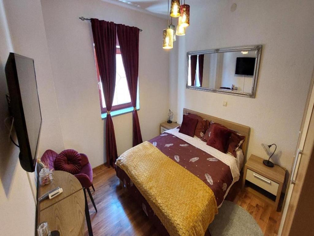 Postel nebo postele na pokoji v ubytování 4 Colors Rooms, Cres