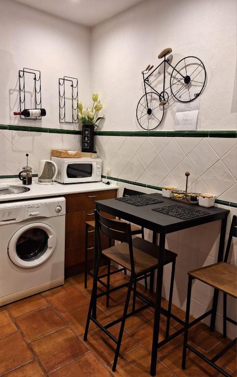 Kuchyň nebo kuchyňský kout v ubytování CASA DE FLORES