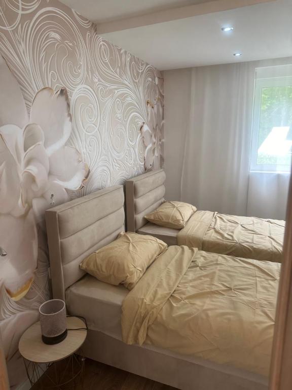 Postel nebo postele na pokoji v ubytování Villa Albatros
