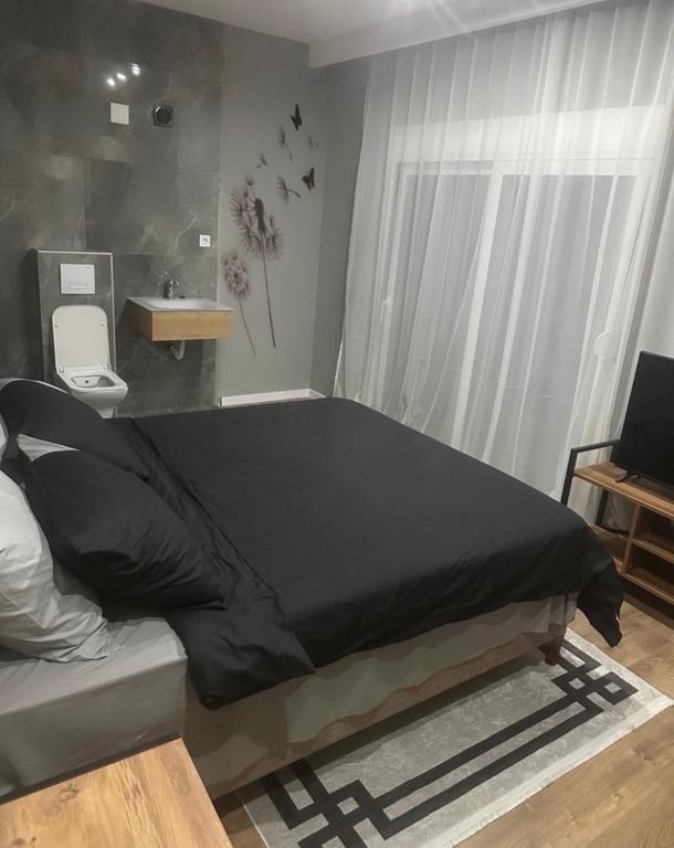 Postel nebo postele na pokoji v ubytování Villa Albatros