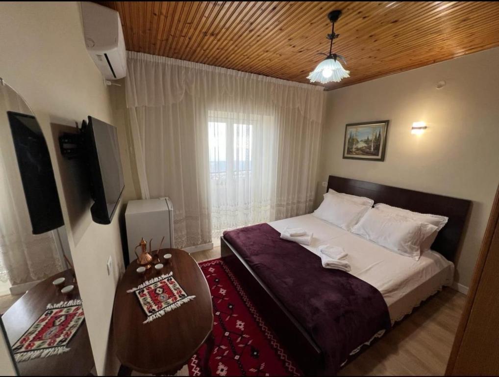 Postel nebo postele na pokoji v ubytování Garden Villa Guni
