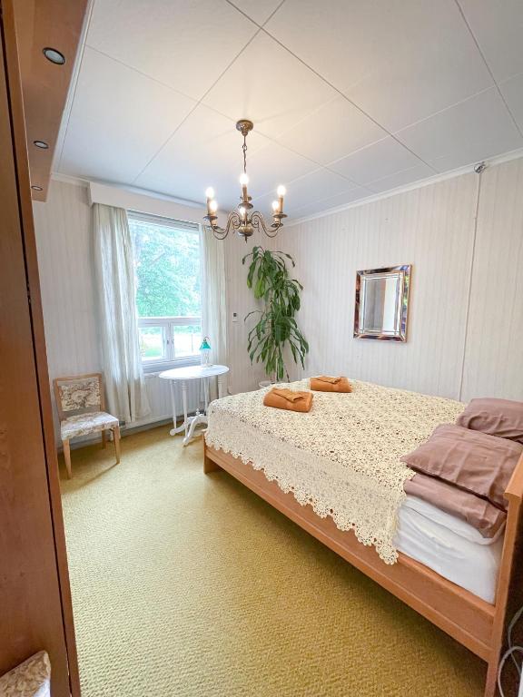 Vuode tai vuoteita majoituspaikassa Lindallén Guest House