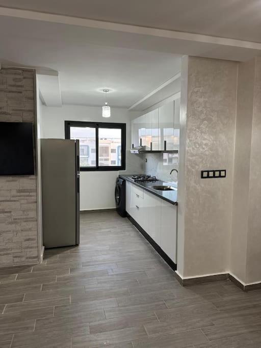 Kuchyň nebo kuchyňský kout v ubytování appartement moderne vue piscine