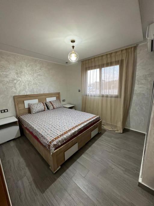 Postel nebo postele na pokoji v ubytování appartement moderne vue piscine