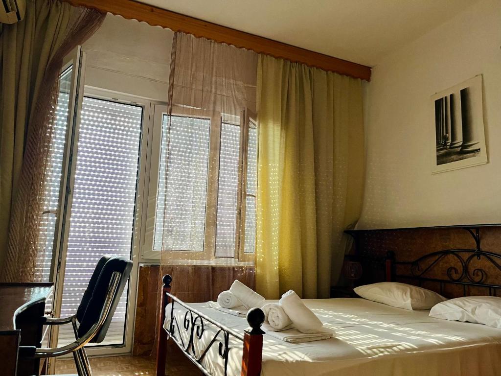 Postel nebo postele na pokoji v ubytování Hotel Holiday