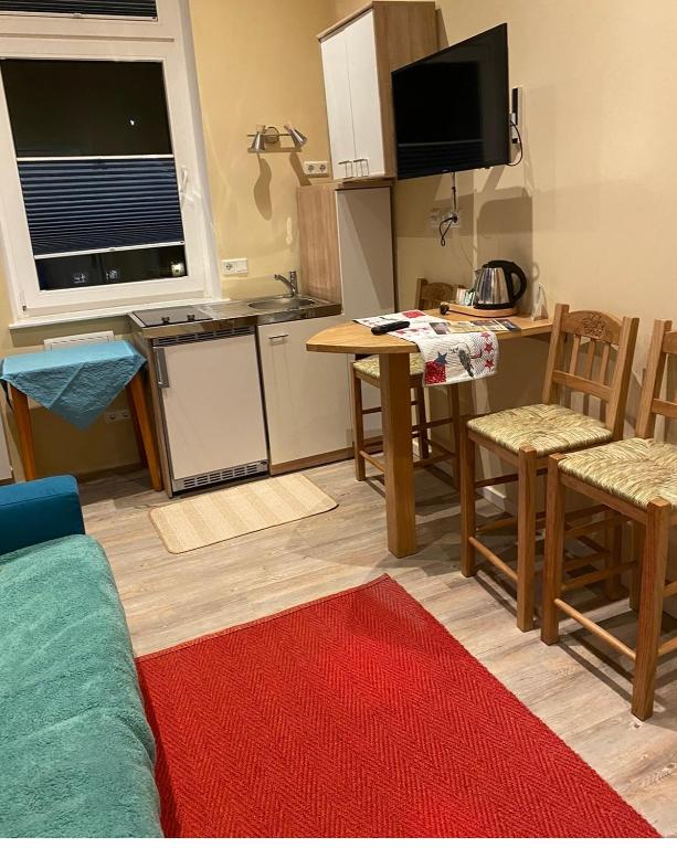 Kuchyň nebo kuchyňský kout v ubytování Haus Seemannstreu