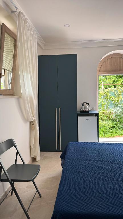 Postel nebo postele na pokoji v ubytování Il Cigno B&B
