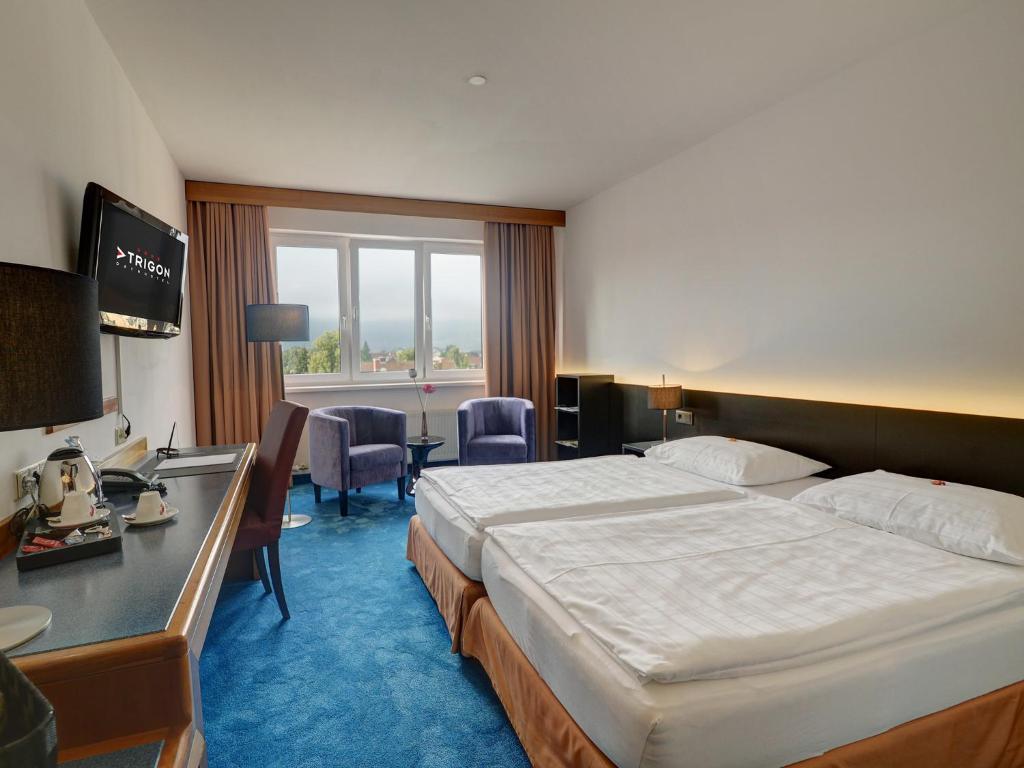 Televiisor ja/või meelelahutuskeskus majutusasutuses Skycity Hotel Atrigon