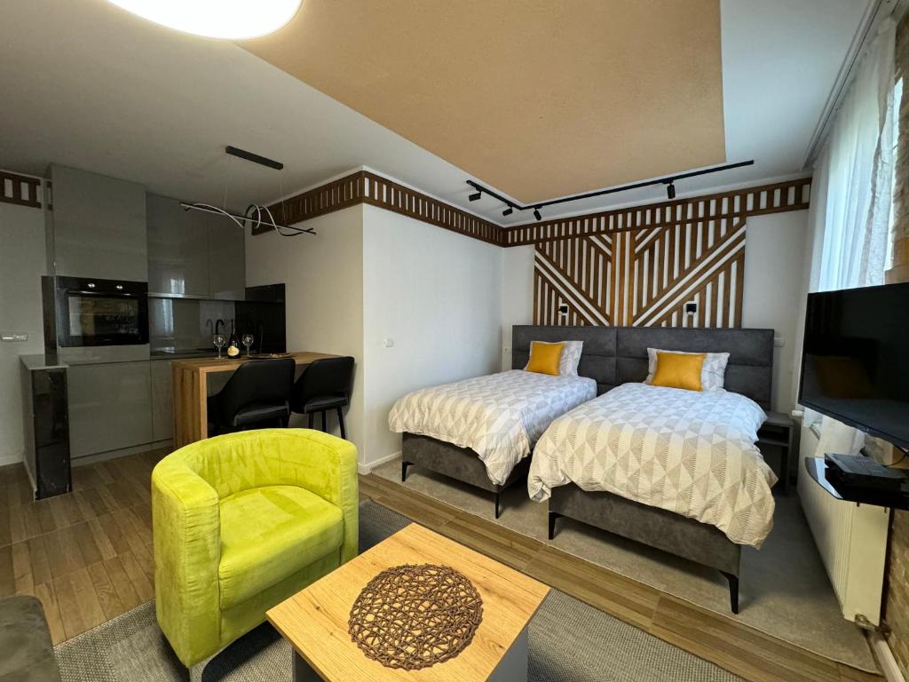 Postel nebo postele na pokoji v ubytování Apartments Radović