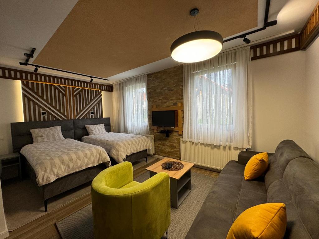 Postel nebo postele na pokoji v ubytování Apartments Radović