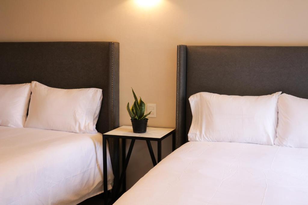 Postel nebo postele na pokoji v ubytování Casa Relox 43